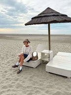 Women's pullover sweater featuring a textured swirl design, made from soft knit material for warmth and comfort.