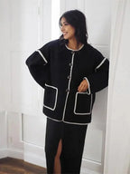 Women's relaxed fit cardigan featuring contrast stitching, crafted from soft, breathable fabric for comfortable everyday…