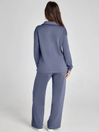 Women's relaxed-fit long-sleeve top paired with wide-leg pants, crafted from soft, breathable cotton for all-day comfort.