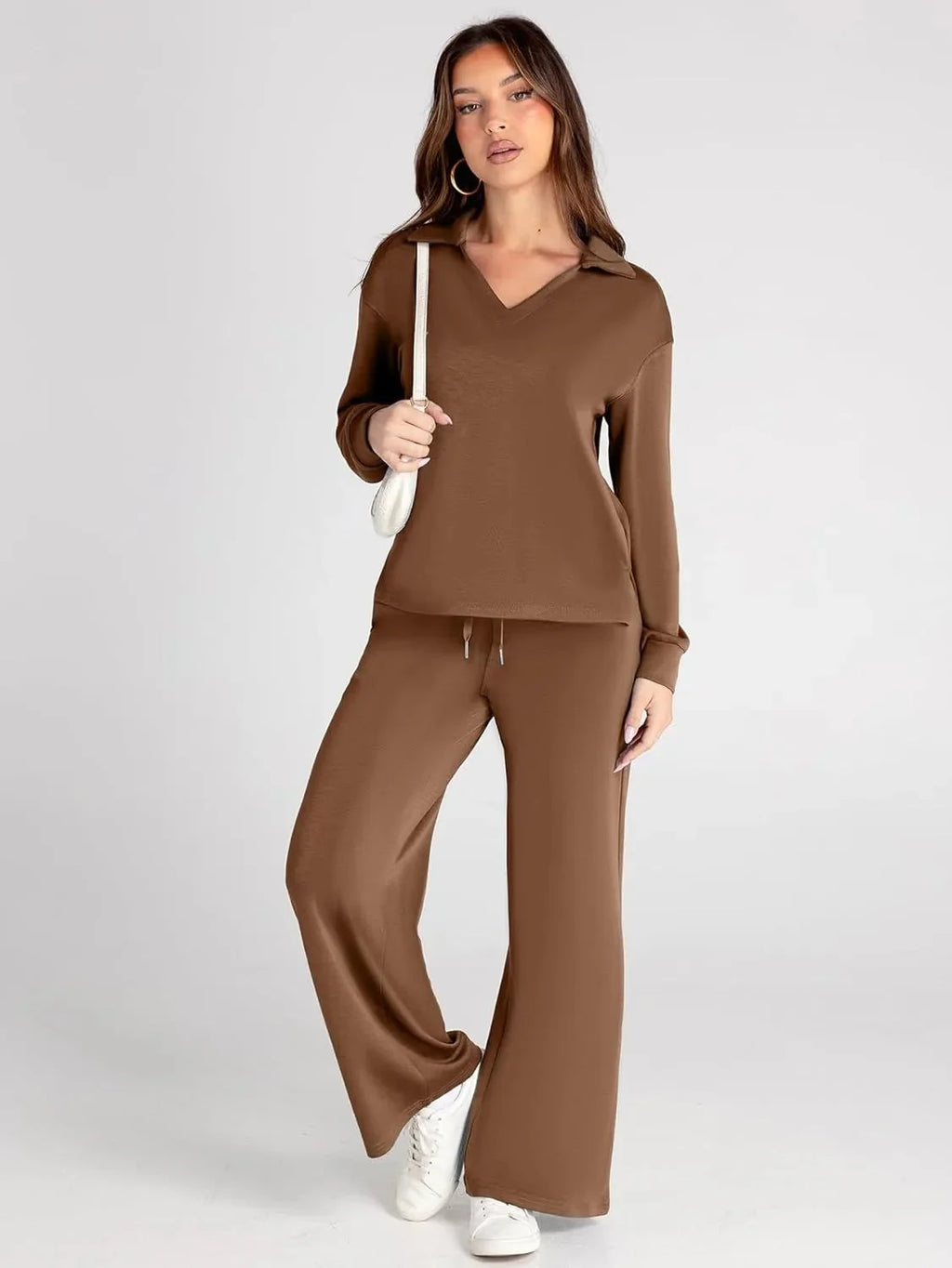 Women's relaxed fit long-sleeve top paired with wide-leg pants, crafted from soft cotton for comfort and easy movement.