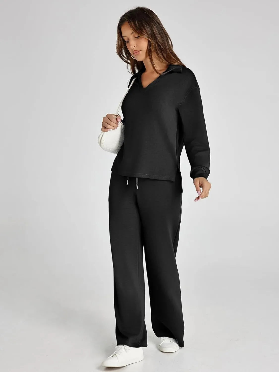 Women's relaxed fit long-sleeve top paired with wide-leg pants, made from soft, breathable cotton for everyday comfort.