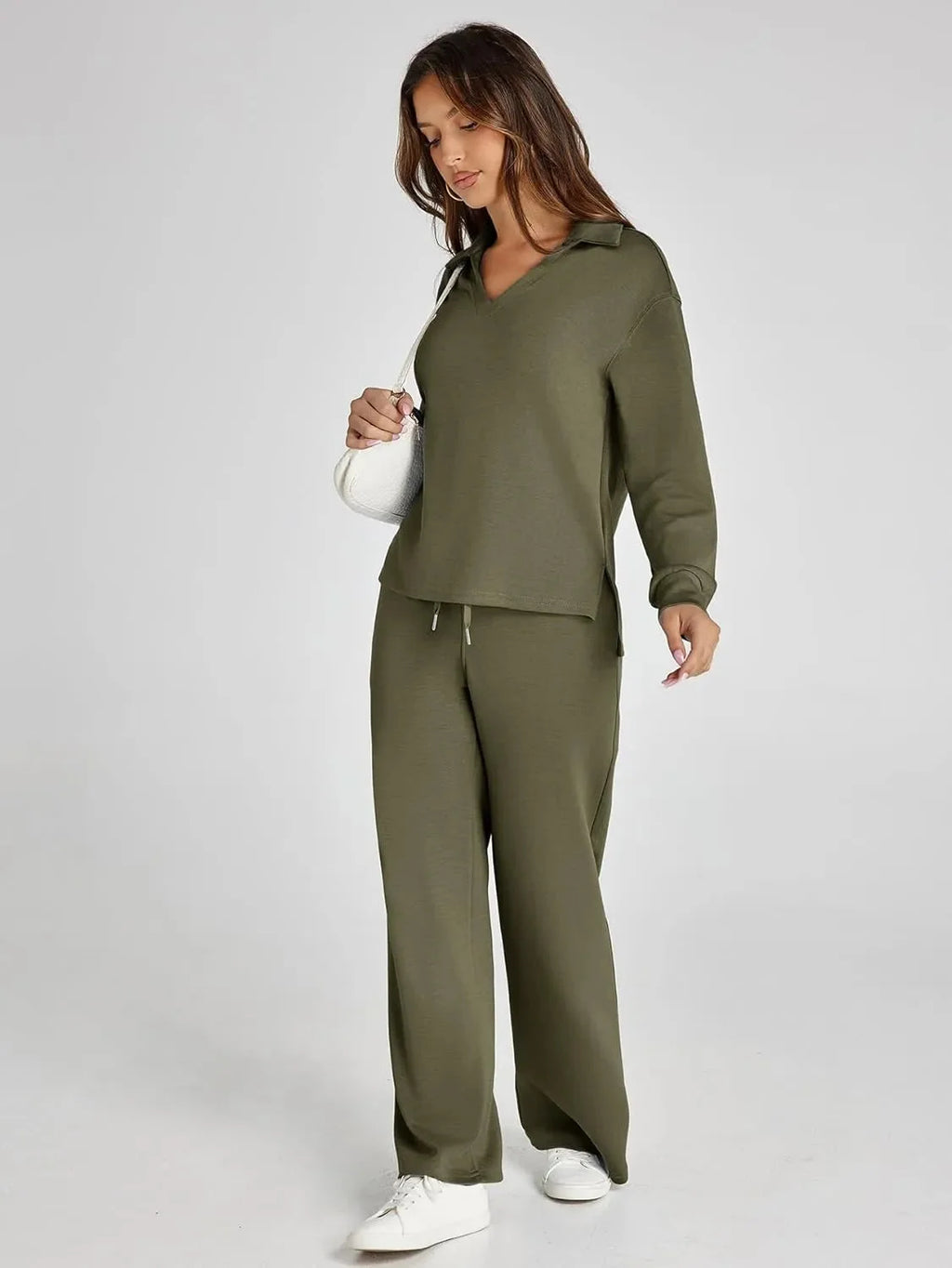 Women's relaxed fit long-sleeve top and wide-leg pants set, made from soft cotton blend, featuring a comfortable, casual…