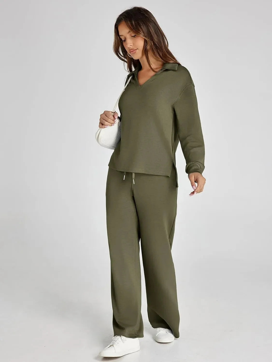 Women's relaxed fit long-sleeve top and wide-leg pants set, made from soft cotton blend, featuring a comfortable, casual…