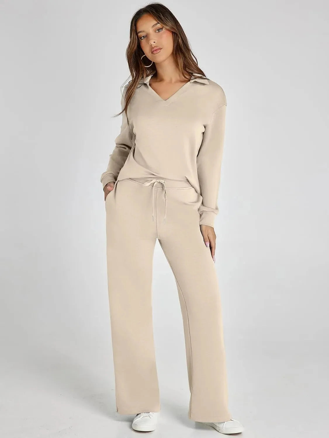 Women's relaxed-fit long-sleeve top paired with wide-leg pants, crafted from soft cotton for comfort and everyday wear.