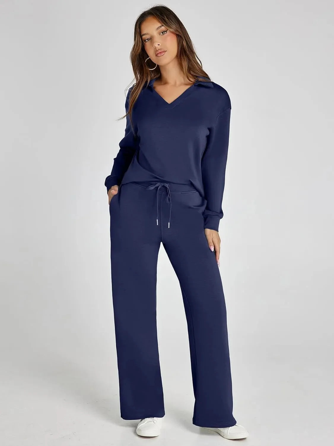 Women's relaxed fit long-sleeve top in soft cotton, paired with breathable wide-leg pants for easy, comfortable wear.