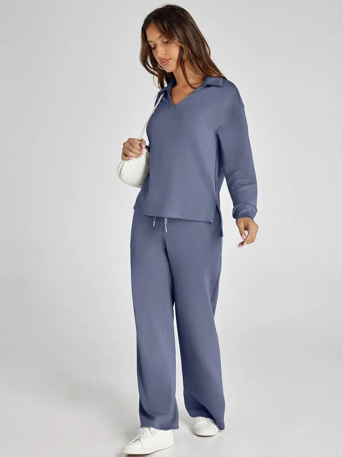 Lightweight cotton long-sleeve top with relaxed fit, paired with wide-leg pants for comfortable, casual wear.