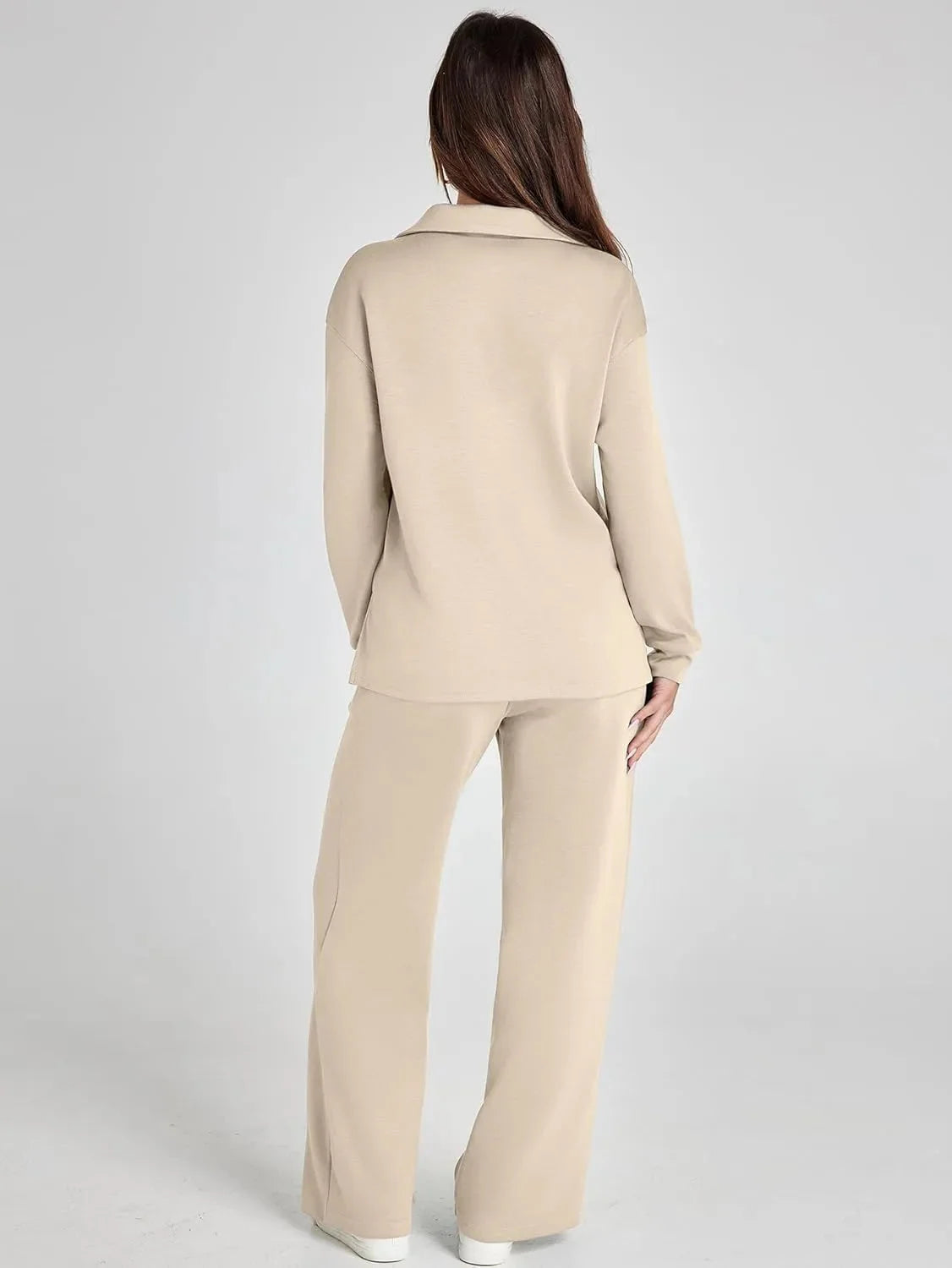 Women's relaxed fit long-sleeve top and wide-leg pants set, made of soft cotton fabric for comfortable everyday wear.