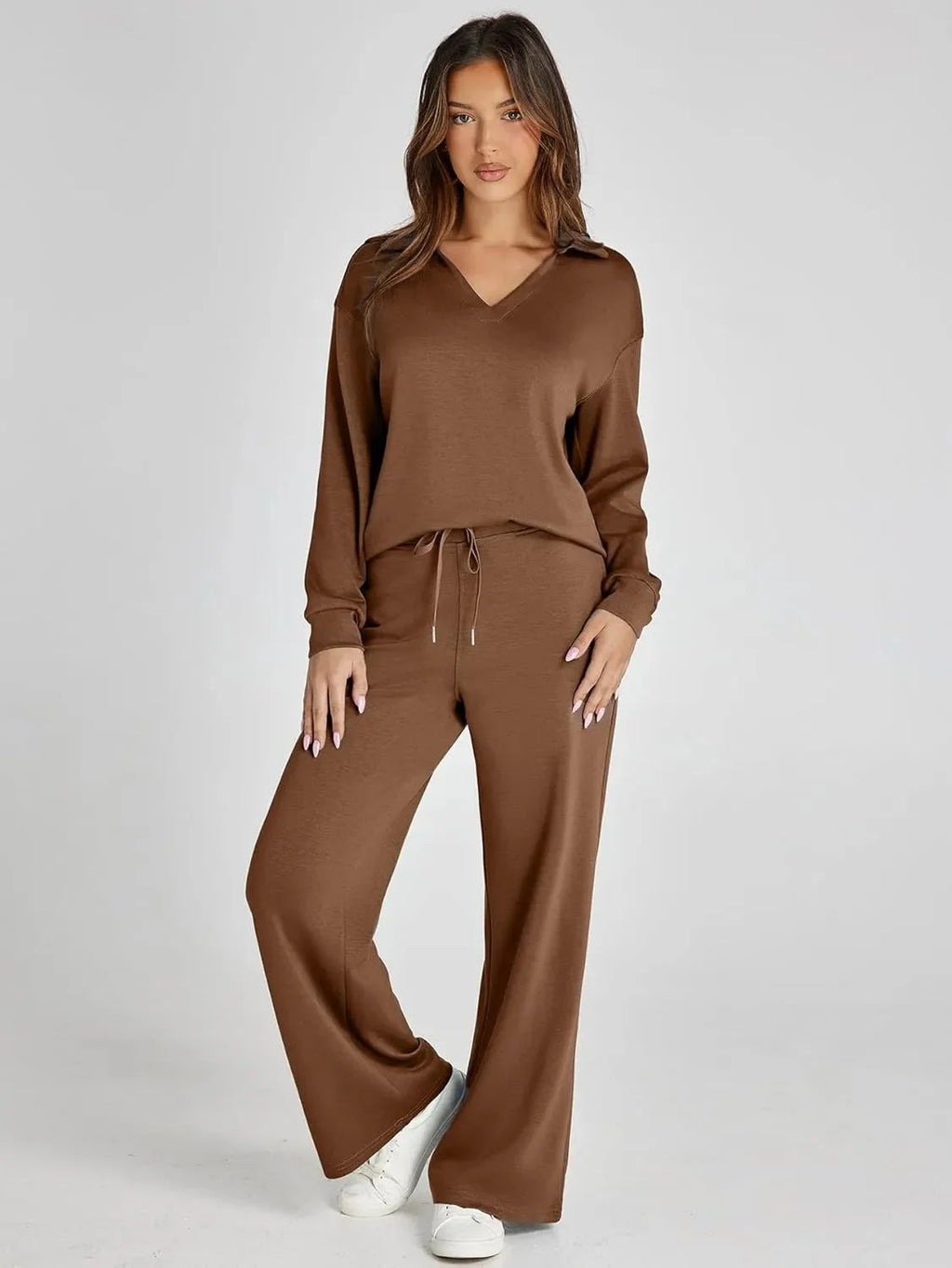 Women's relaxed fit long-sleeve top paired with wide-leg pants, crafted from soft cotton for comfort and easy movement.