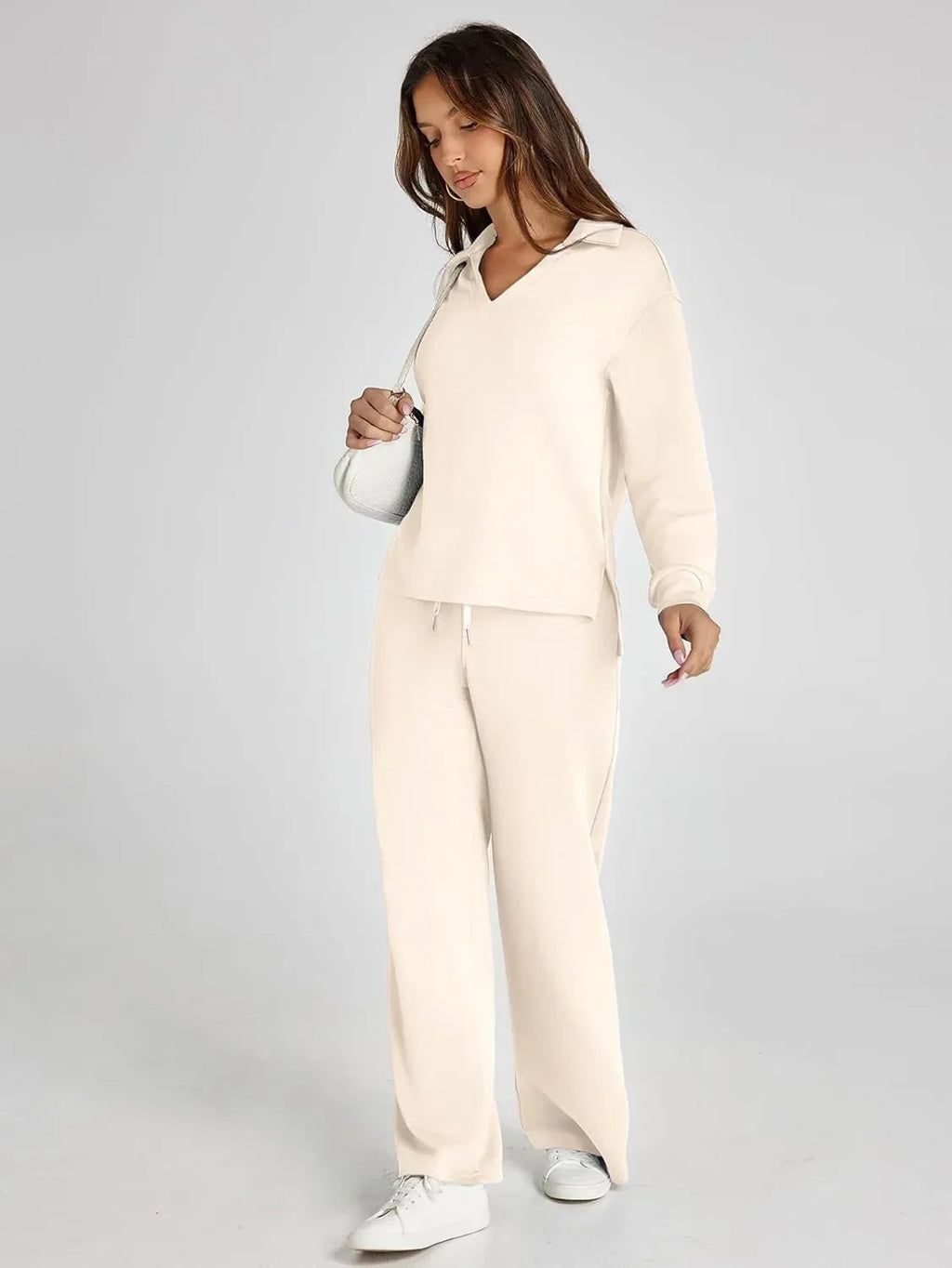 Women's relaxed fit long-sleeve top and wide-leg pants set, made from soft cotton blend with a comfortable, casual design.