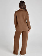 Alt text: Women's relaxed fit long-sleeve top in soft fabric paired with wide-leg pants, perfect for casual comfort and…