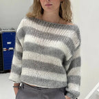 Women's relaxed fit striped knit pullover sweater in soft, breathable fabric with a casual design for everyday comfort.