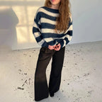 Women's relaxed fit striped knit pullover sweater in soft cotton blend, featuring a classic crew neck and long sleeves.