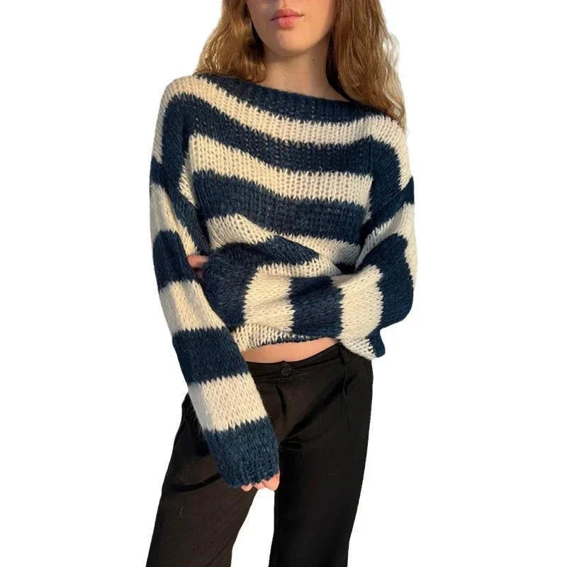 Women's relaxed fit striped knit pullover sweater made of soft cotton blend, featuring a casual design and comfortable fit.