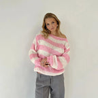 Women's relaxed fit pullover sweater in striped knit, featuring soft cotton blend fabric and comfortable long sleeves.