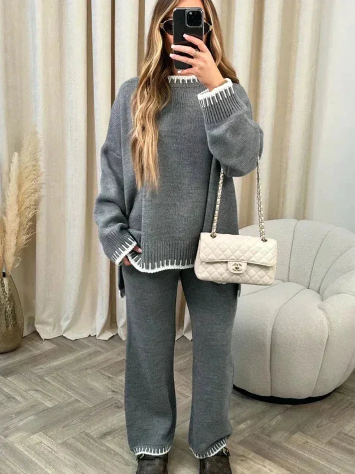 Soft cotton-blend women's relaxed fit sweater and pants set, featuring a simple design and comfortable, breathable fabric.