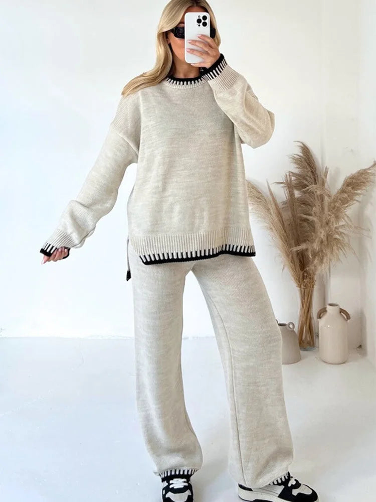 Women's relaxed fit two-piece knitwear set featuring soft fabric and stylish contrast trim for casual comfort.