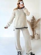 Women's relaxed fit two-piece knitwear set featuring soft fabric and stylish contrast trim for casual comfort.