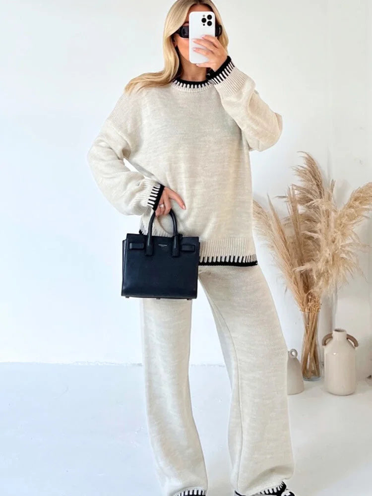 Women's relaxed fit two-piece knitwear set featuring a soft fabric, contrast trim, and comfortable, casual design.
