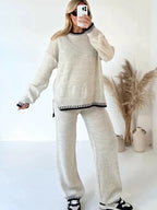 Women's relaxed fit two-piece knitwear set in soft cotton blend, featuring contrast trim for a stylish and comfortable look.