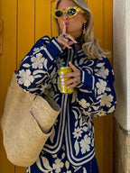 Alt text: Women's retro boho quilted jacket in cotton with intricate floral patterns and a relaxed fit for casual wear.