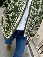 Women's retro boho style quilted jacket with a cozy, patterned fabric and contrasting trim, perfect for cool weather…