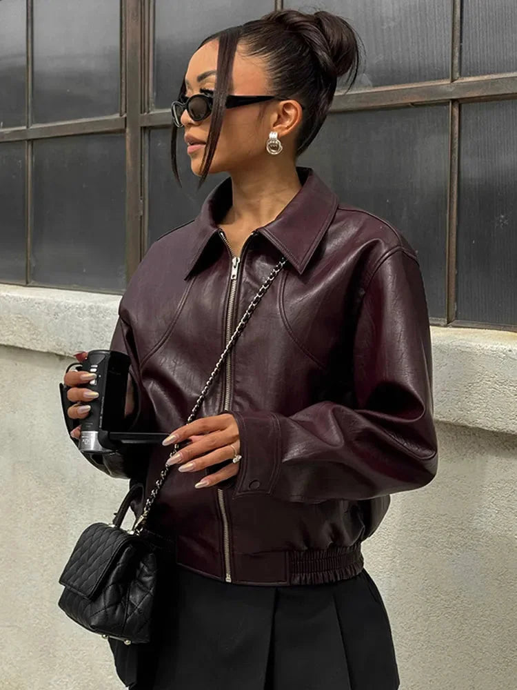 Women's retro style jacket in deep burgundy, featuring soft fabric, vintage cut, and classic buttoned front design.
