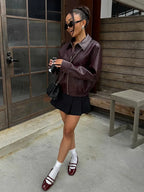 Women's retro style jacket in deep burgundy, featuring a vintage cut, soft fabric, and stylish button details.