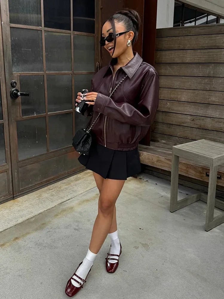 Women's retro style jacket in deep burgundy, featuring a vintage cut, soft fabric, and stylish button details.