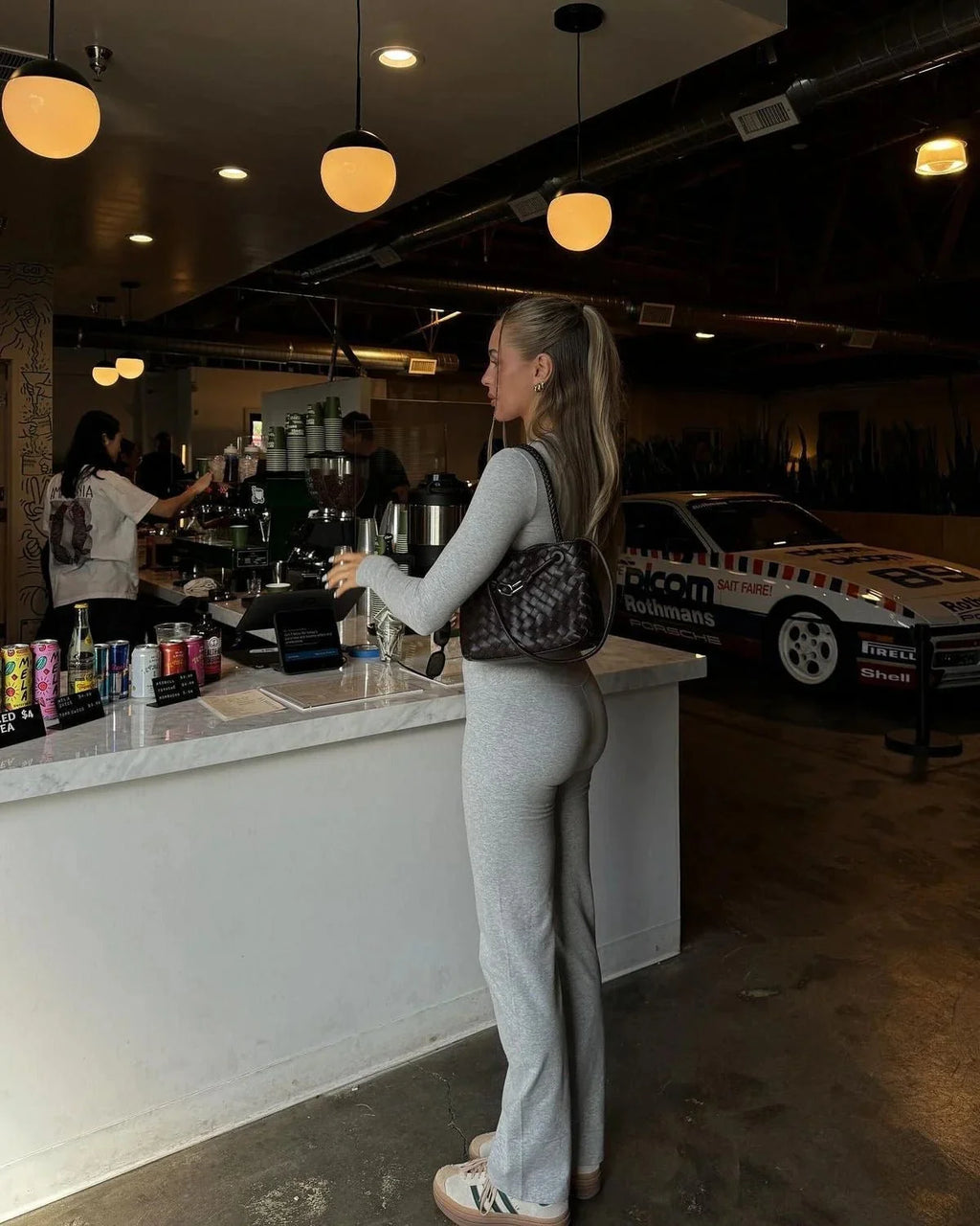 Women's ribbed lounge set featuring long sleeves and flared pants, made from soft, breathable fabric for comfortable…