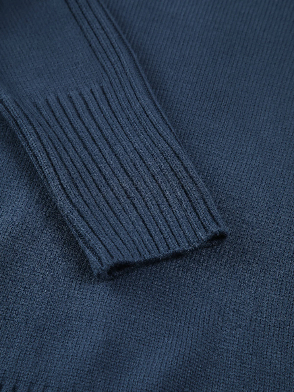 Women's ribbed mock neck knit sweater in soft, stretchy fabric with a fitted silhouette and long sleeves for added warmth.