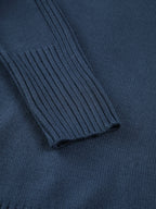 Women's ribbed mock neck knit sweater in soft, stretchy fabric with a fitted silhouette and long sleeves for added warmth.