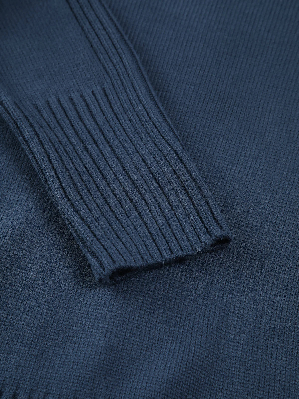 Women's ribbed mock neck knit sweater in soft, stretchy fabric with a fitted silhouette and long sleeves for added warmth.