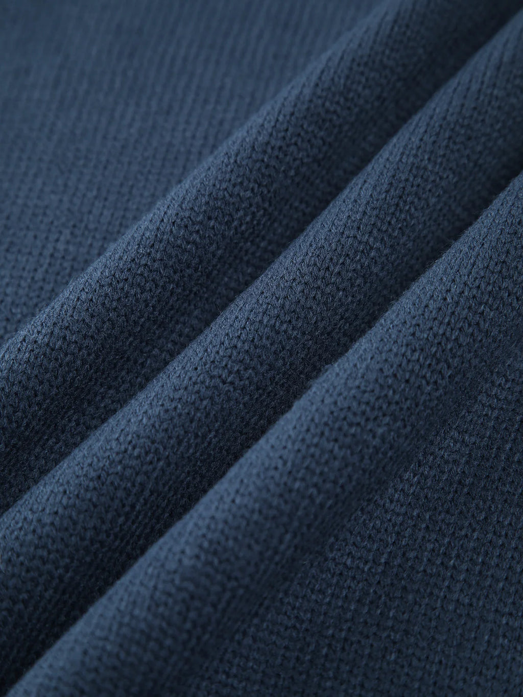 Women's ribbed mock neck knit sweater in soft, stretchable fabric with a fitted silhouette and long sleeves for added warmth.