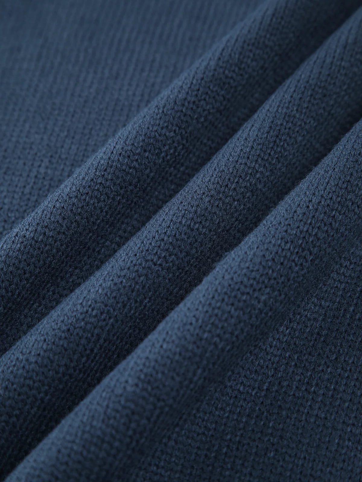 Women's ribbed mock neck knit sweater in soft, stretchable fabric with a fitted silhouette and long sleeves for added warmth.