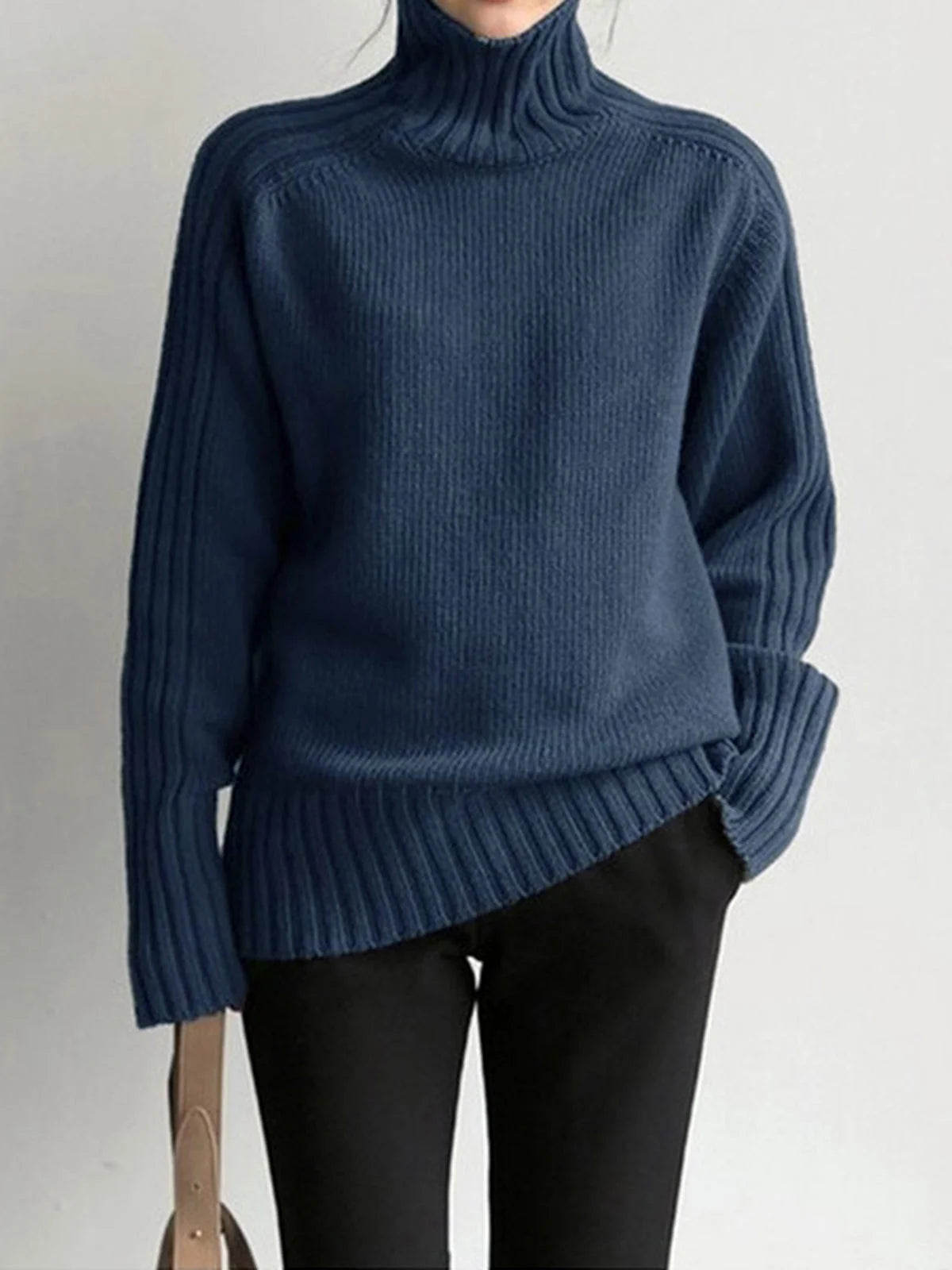"Women's ribbed mock neck knit sweater in soft fabric, featuring a fitted design and long sleeves for a cozy fit."
