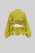 Women's ruffled belted shirt with voluminous sleeves, made from lightweight cotton with a relaxed fit and stylish details.