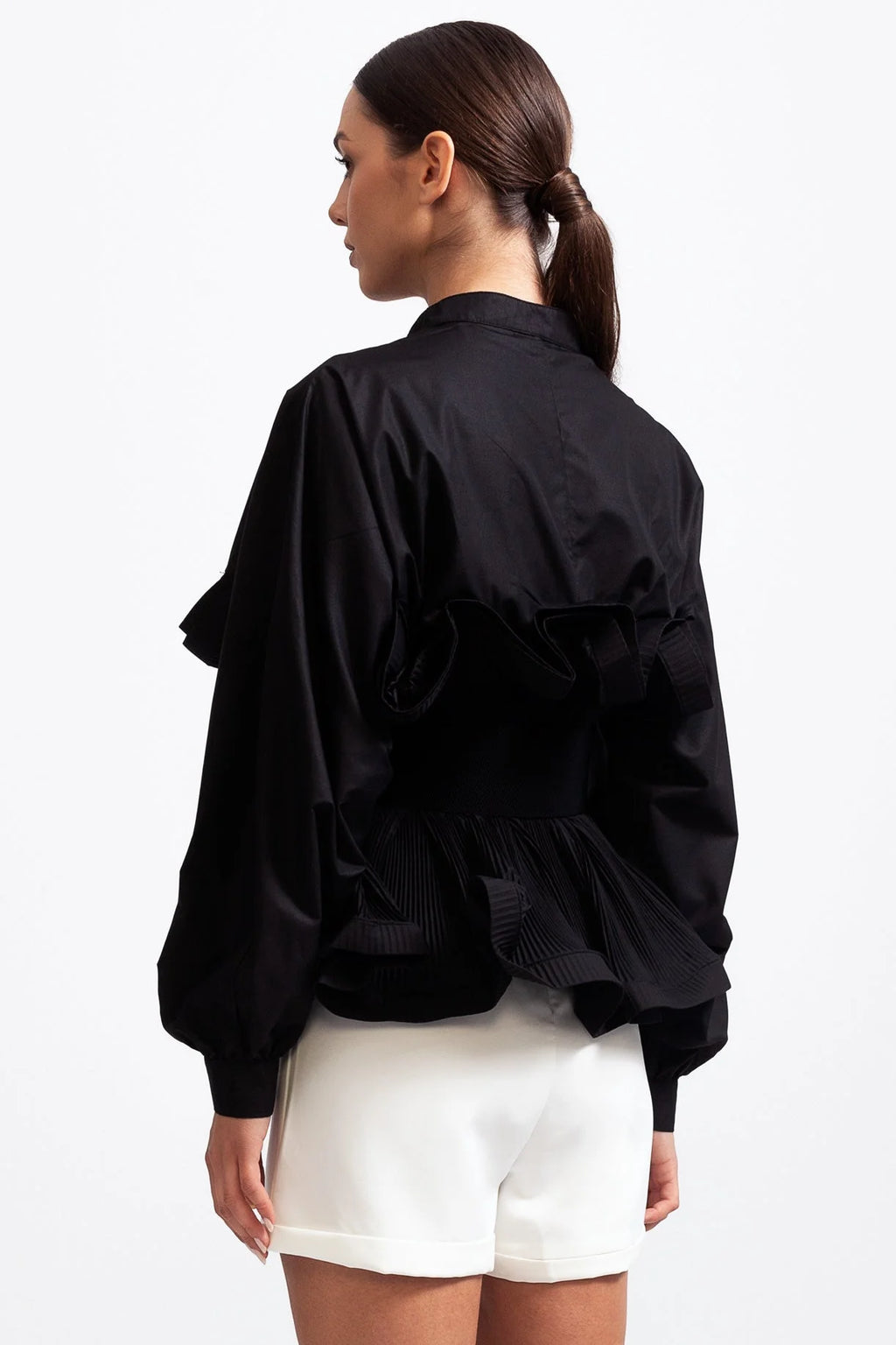 Women's ruffled belted shirt featuring voluminous sleeves, made of soft cotton blend for a flowy and stylish look.