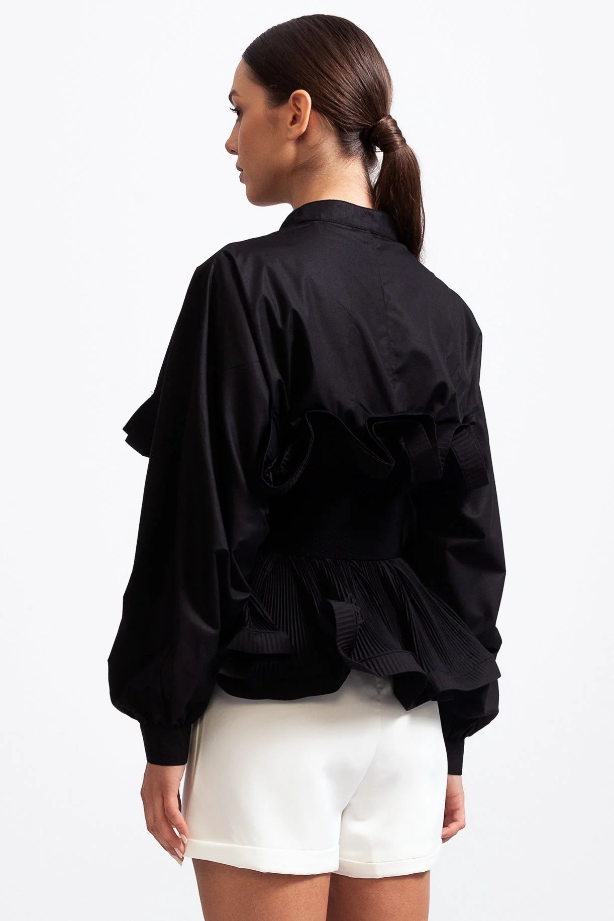 Women's ruffled belted shirt featuring voluminous sleeves, made of soft cotton blend for a flowy and stylish look.