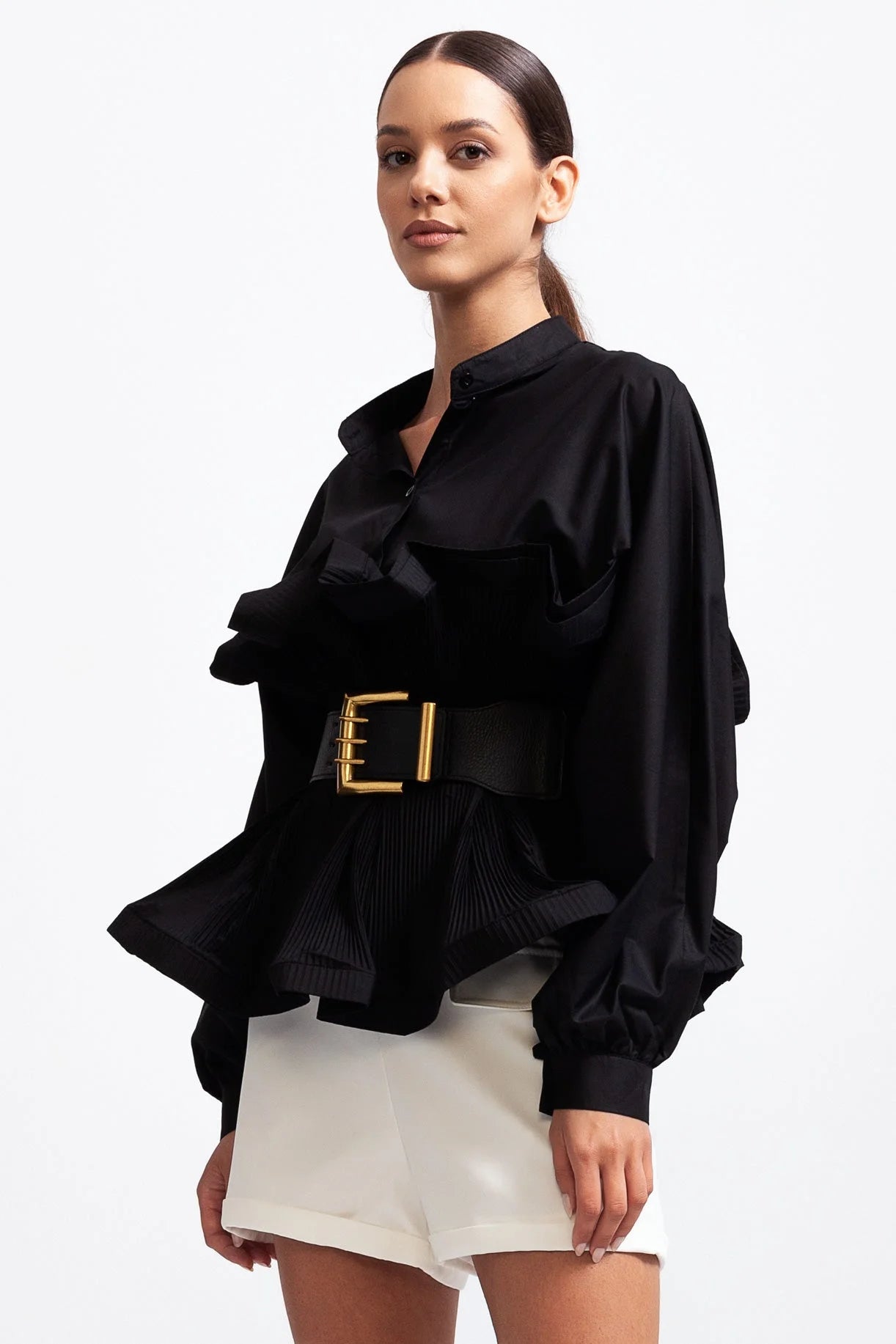Women's ruffled belted shirt in lightweight cotton, featuring voluminous sleeves and a stylish cinched waist for a chic look.