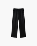 Women's relaxed fit satin jacket and pants set, featuring soft fabric and a smooth finish for comfortable everyday wear.