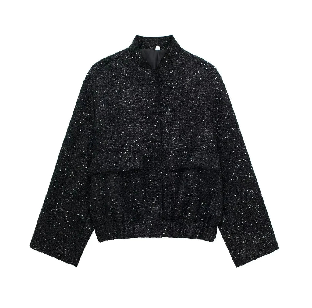Women's sequin jacket with a modern design, featuring a shimmering finish and durable fabric for stylish layering.