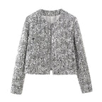 Women's open front jacket made of shimmering silver sequins, featuring a relaxed fit and long sleeves for an elegant look.