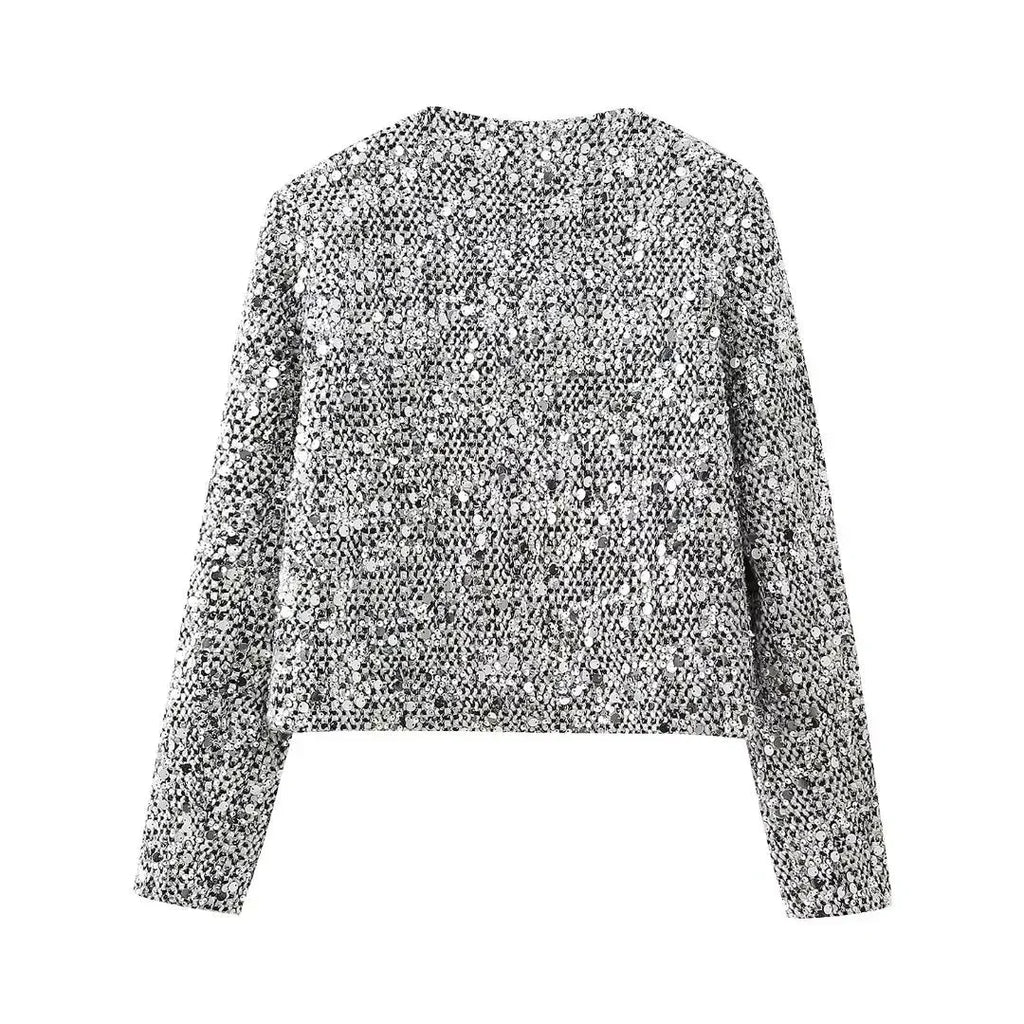 Women's silver sequin open front jacket featuring a lightweight design and sparkling sequins for a stylish, eye-catching…