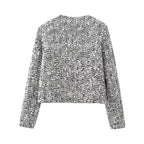 Women's silver sequin open front jacket featuring a lightweight design and sparkling sequins for a stylish, eye-catching…