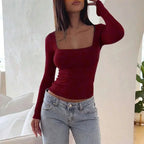 Women's square-neck contour top with long sleeves, made of soft cotton blend, featuring a tailored fit and classic design.
