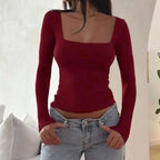Women's long-sleeve square-neck contour top in soft cotton blend, featuring a fitted silhouette and elegant design.