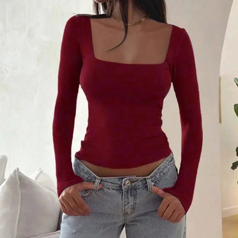 Women's long-sleeve square-neck contour top in soft cotton blend, featuring a fitted silhouette and elegant design.