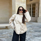 Women's stand collar single-breasted jacket made of soft fabric, featuring a loose fit and simple design for casual wear.