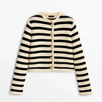 Women's striped button-up cardigan featuring a round neckline, crafted from soft cotton blend for comfort and style.