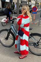 Women's striped knit long cardigan featuring a cozy texture, open front, and a relaxed fit, perfect for layering.